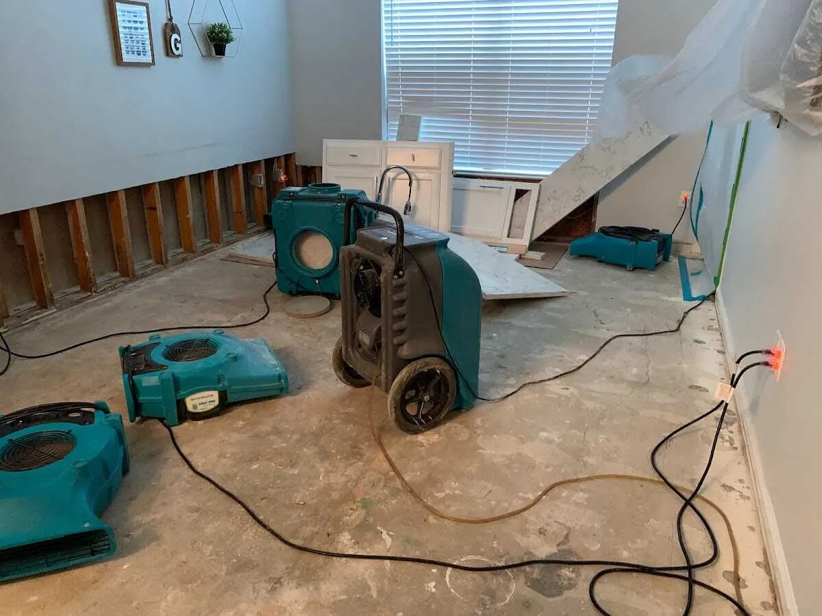Dehumidifier in flood-cut room for Water Damage Restoration in Shawnee